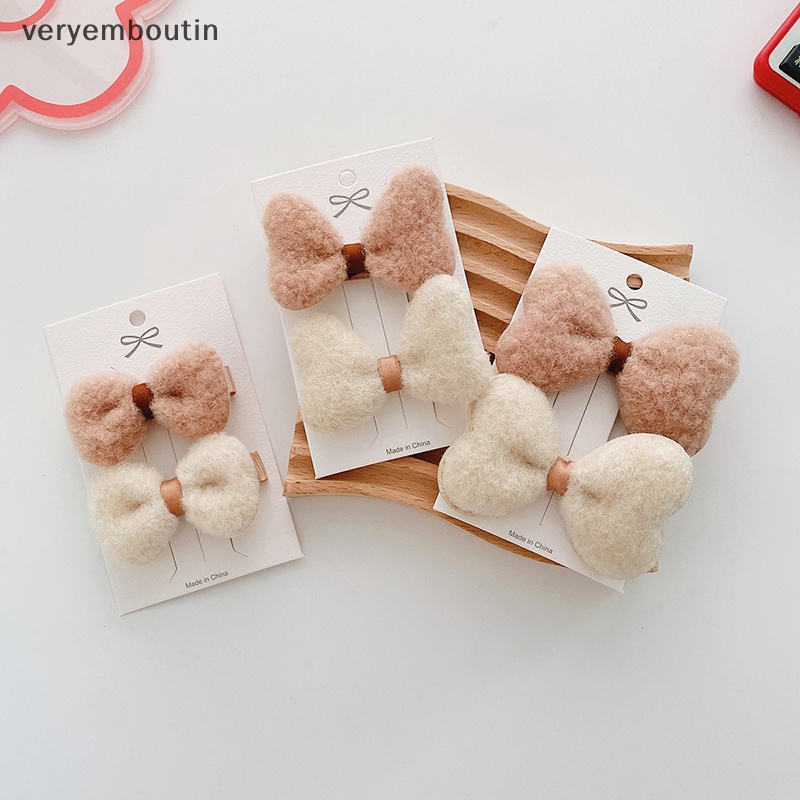 Bộ 2 Kẹp Tóc Vải Lông Mềm Đính Nơ Xinh Xắn Cho Bé Gái