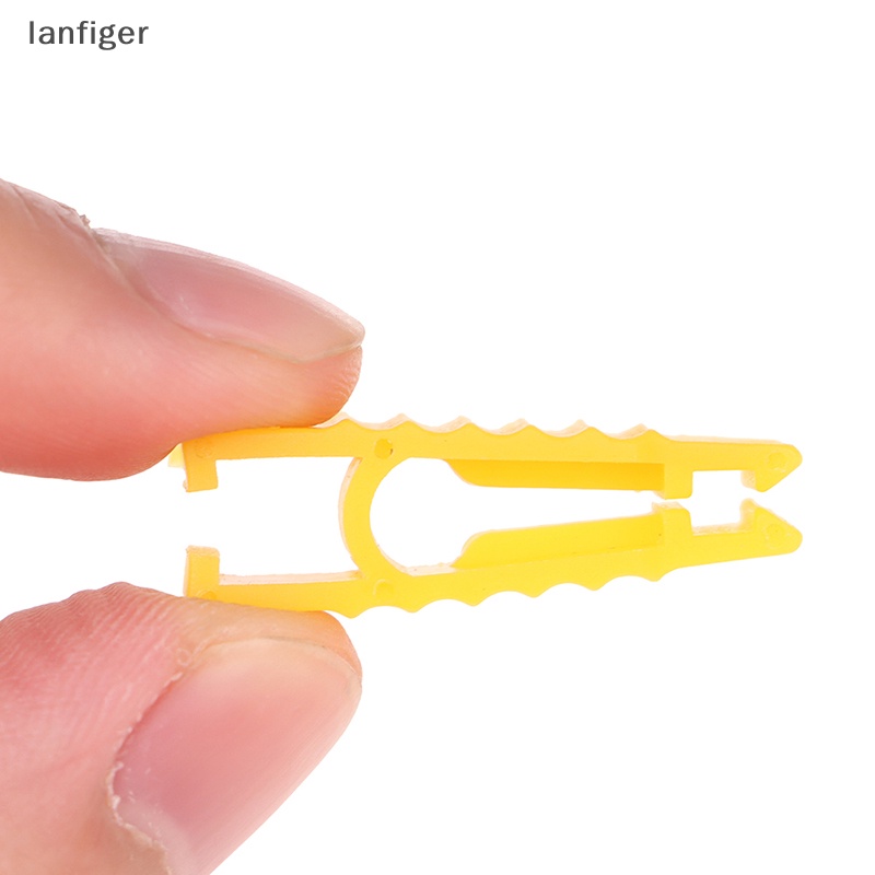 Set 10 Nhíp Kẹp Cố Định Cầu Chì Xe Hơi Bằng Nhựa Màu Vàng