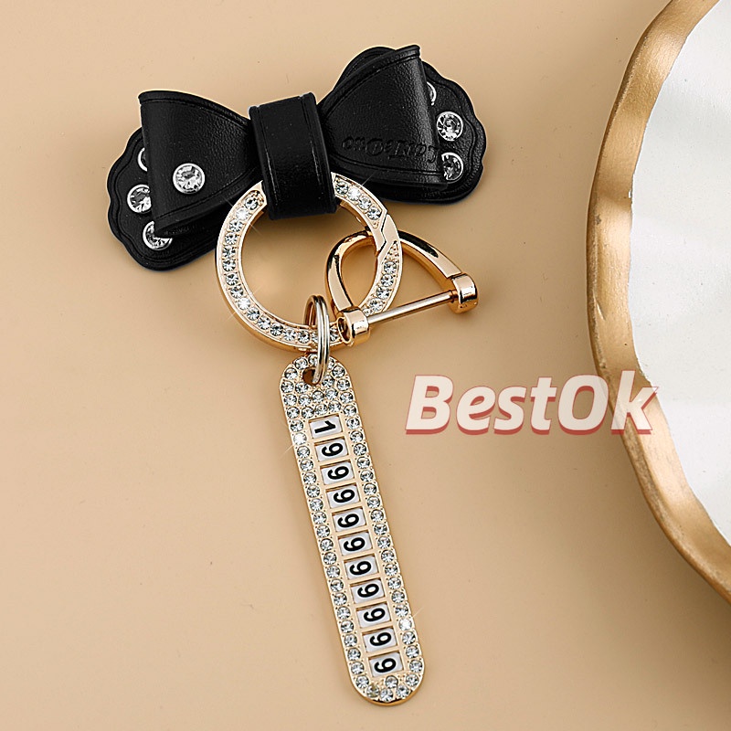 Móc Khóa Da Đính Đá Kim Loại Màu Vàng Hình Nơ Dễ Thương Có Biển Số Cho Nam Và Nữ