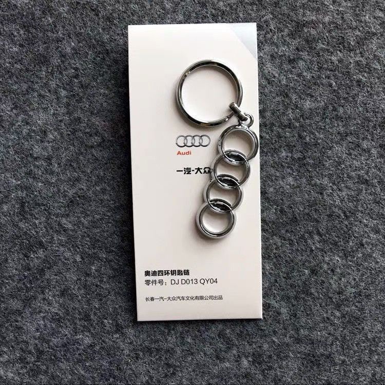 Móc Khóa Xe Hơi Audi Đánh Dấu Bốn Vòng Chất Lượng Cao Phong Cách Mới Dùng Làm Quà Tặng Cho Nam Và Nữ
