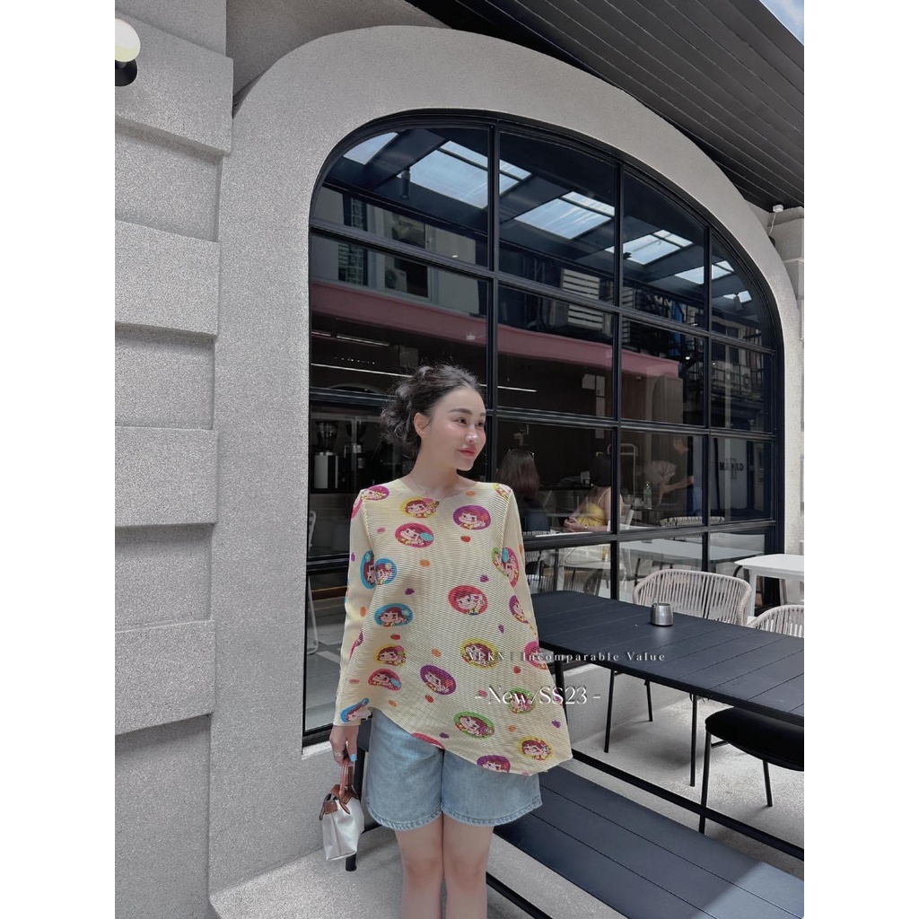 Áo dập ly hoạt hình xéo tà