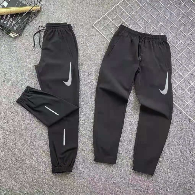 Quần chạy bộ Nike 100% Chính Hãng Dáng Ôm Nhanh Khô Thiết Kế Giản Dị Dành Cho Nam