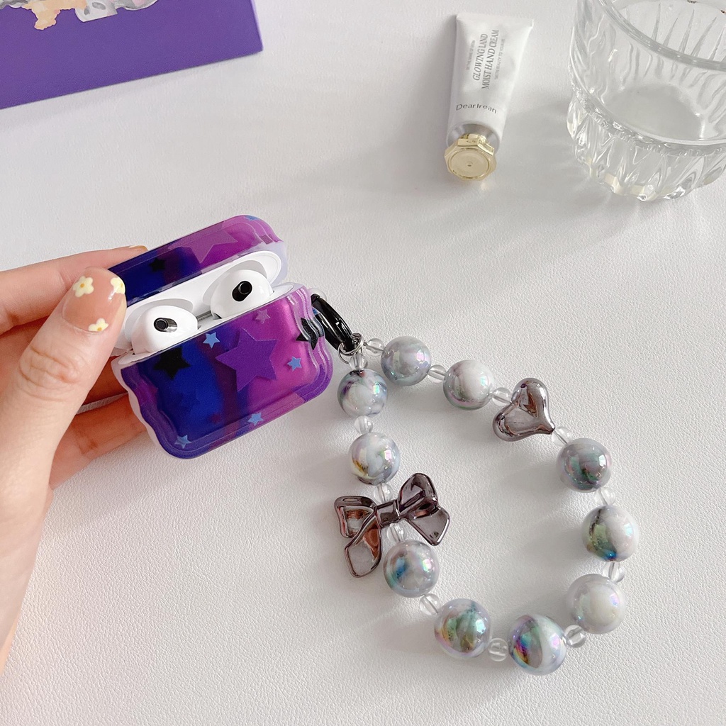 Vỏ Bảo Vệ Hộp Sạc Tai Nghe Bluetooth AirPods 1 2 gen3 pro2 2022 Bằng Silicon tpu Mềm Chống Trầy Hình Ngôi Sao Màu Tím Kèm Dây Đeo Chuỗi Ngọc Trai
