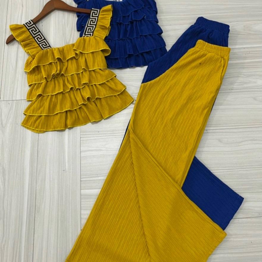 87. 1221 xét bộ quần dài ống suông , áo tay cánh tiên viền hoa văn , áo dập tầng chất thun  xốp,  áo Phong ngắn