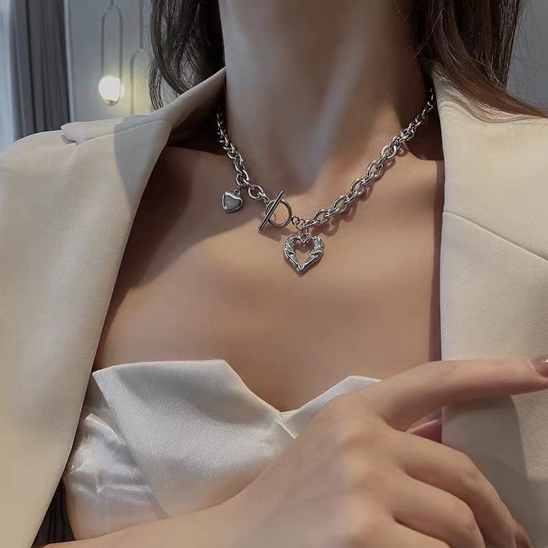 Vòng cổ Thép Titan Bạc Mặt Trái Tim Rỗng Phong Cách Hip Hop Cho Nữ