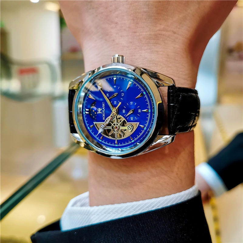 Đồng Hồ Cơ Tự Động Chống Thấm Nước Hình Bánh Đà Rỗng Mặt Trăng Phát Sáng Đa Năng Cao Cấp Cho Nam