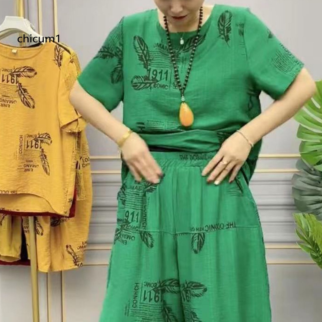 Bộ Đồ Ngủ 2 Món Áo Tay Ngắn Cổ Tròn Phối Quần Short Lưng Thun Mềm Mại Thoáng Khí In Họa Tiết Lông Vũ Thời Trang Mùa Hè Cho Nữ