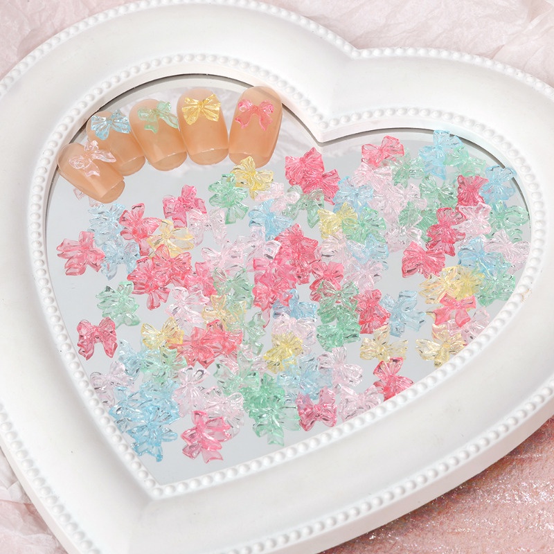 Set 50 Miếng Dán Móng Tay 3D Trong Suốt Hình Nơ Ruy Băng Thắt Nơ Bằng Nhựa Lấp Lánh DIY