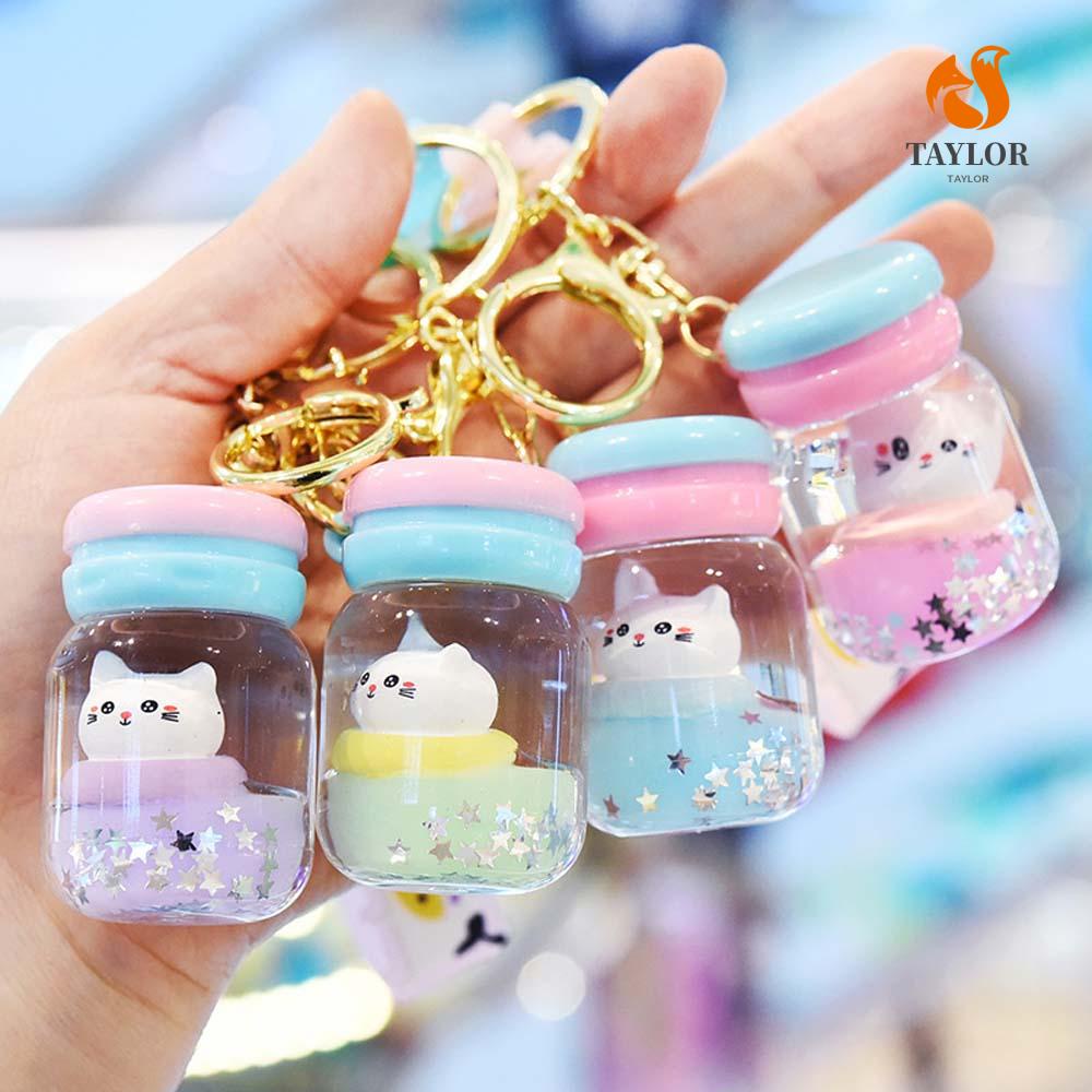 Móc khóa hình bình sữa đáng yêu taylor1
