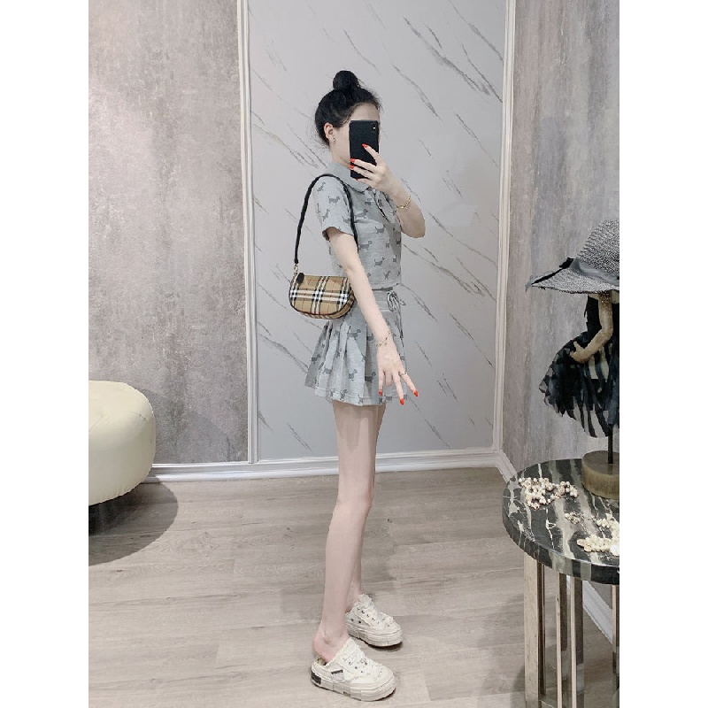 New Internet celebrity fashion folding collar polo shirt pleated skirt two-piece set small casual temperament short-sleeved T-shirt A- line skirt casual sports suit