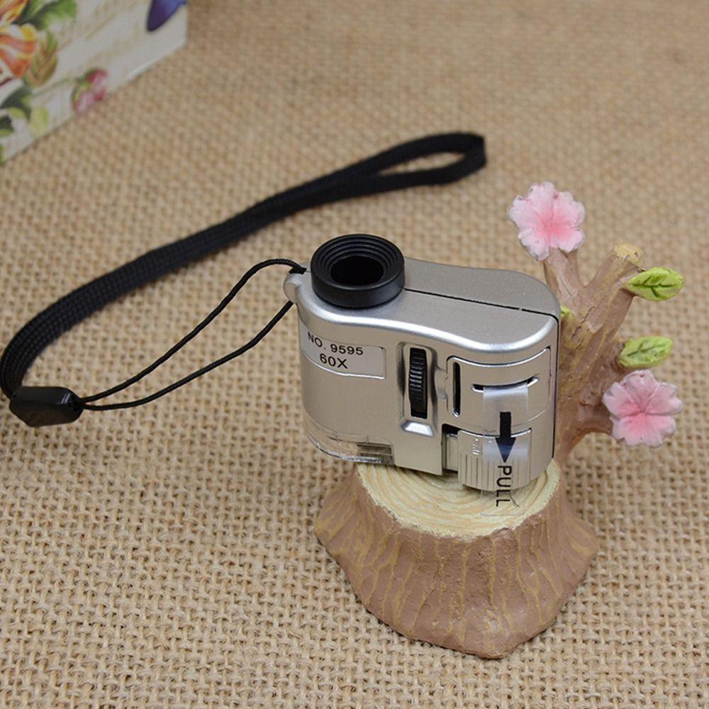 Moc Kính Lúp Phóng Đại 60 Lần Cầm Tay mini Có Đèn led Soi Tia uv