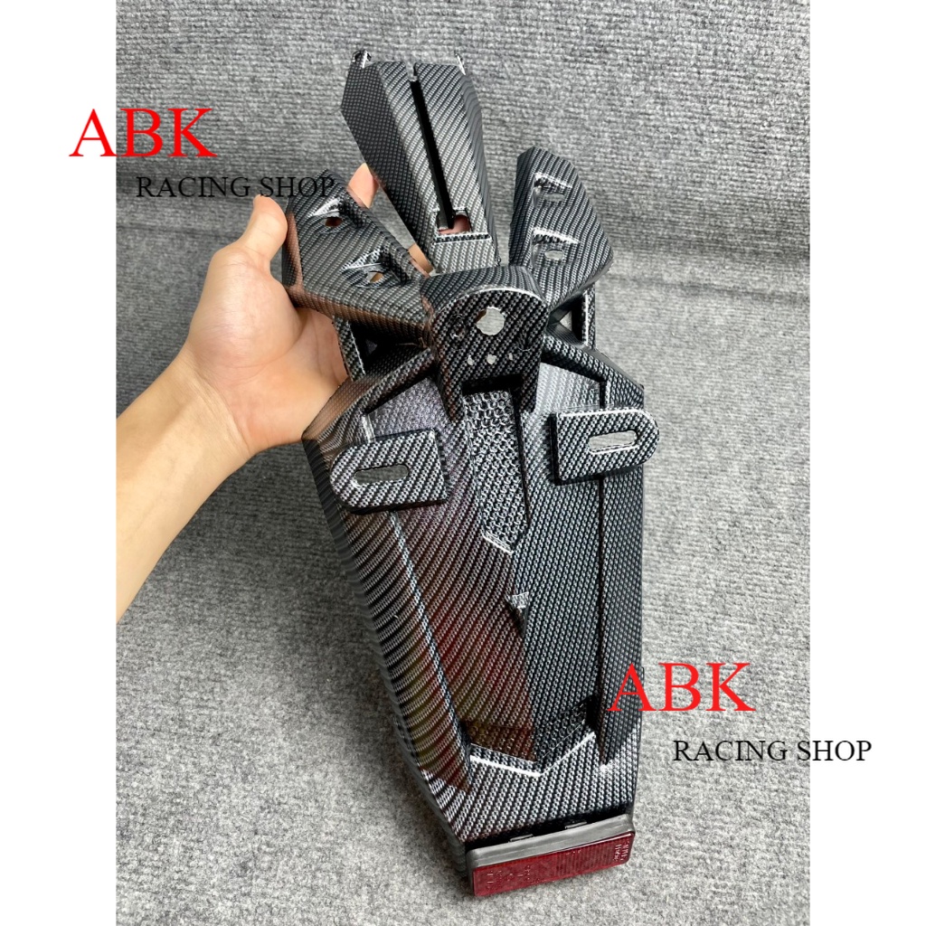 Dè sau CACBON Exciter 150 MX King Malay gắn như ZIN có mắt mèo phản quang