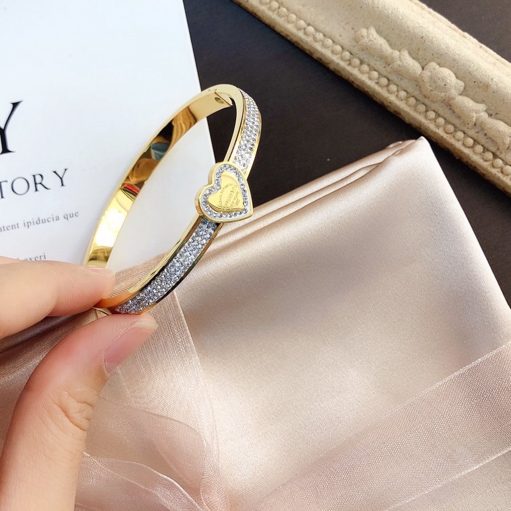 Vòng tay cartier thông thường vòng đeo tay tinh tế rỗng chữ t logo titan thép không thấm nước vòng tay chuỗi không gỉ