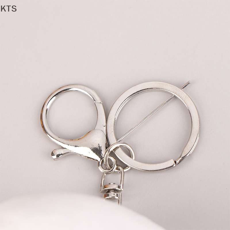 Móc Khóa Banh Xù Hình Mặt Cười Dễ Thương