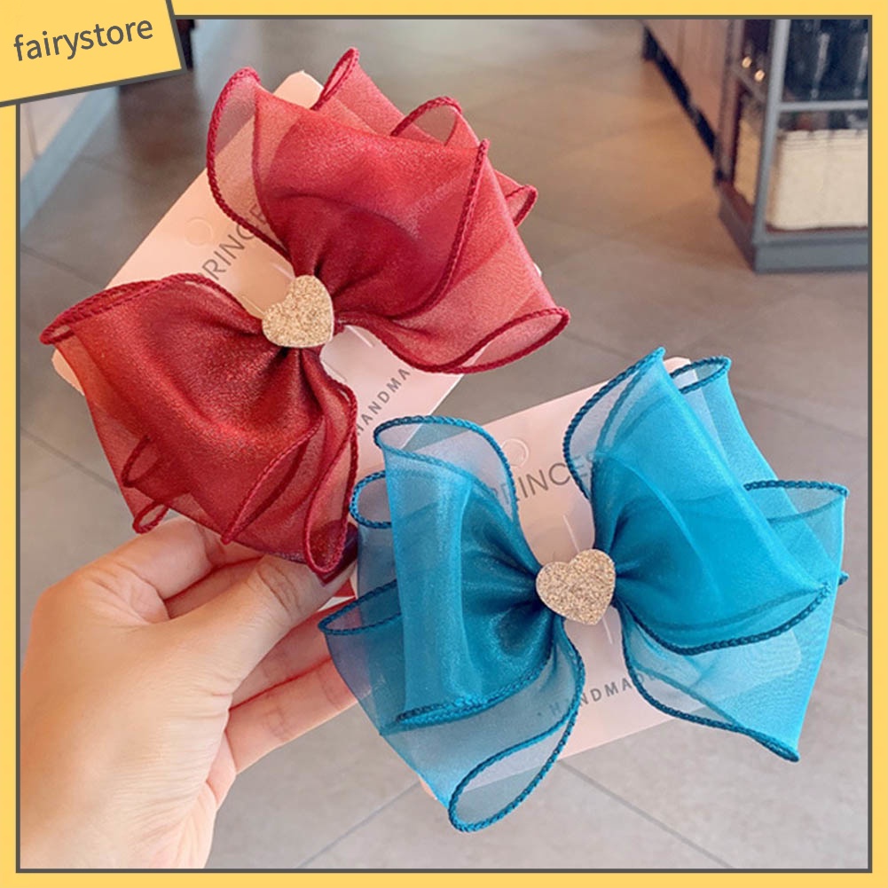 Kẹp Tóc Nơ Hình Trái Tim Lấp Lánh Cho Bé Gái