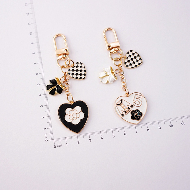 Móc Khóa Mạ Bạc Hình Trái Tim Đính Nơ Xinh Xắn