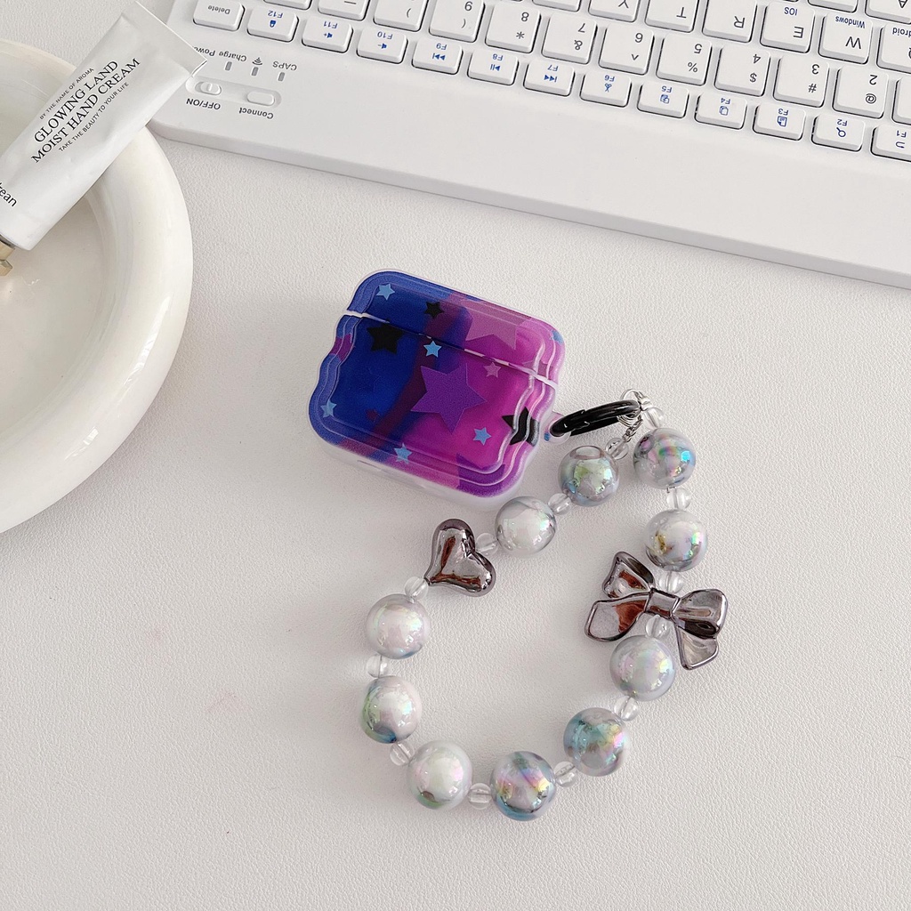 Vỏ Bảo Vệ Hộp Sạc Tai Nghe Bluetooth AirPods 1 2 gen3 pro2 2022 Bằng Silicon tpu Mềm Chống Trầy Hình Ngôi Sao Màu Tím Kèm Dây Đeo Chuỗi Ngọc Trai