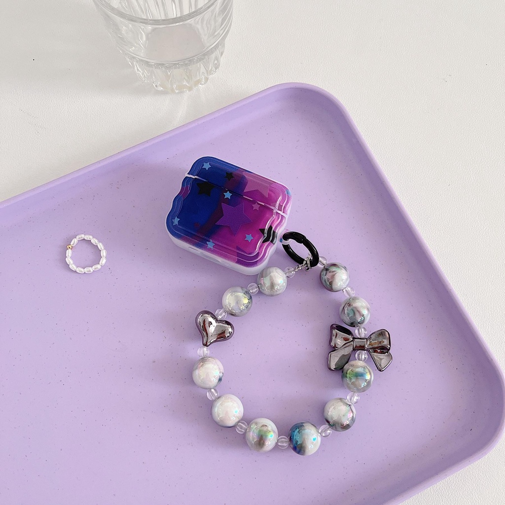 Vỏ Bảo Vệ Hộp Sạc Tai Nghe Bluetooth AirPods 1 2 gen3 pro2 2022 Bằng Silicon tpu Mềm Chống Trầy Hình Ngôi Sao Màu Tím Kèm Dây Đeo Chuỗi Ngọc Trai