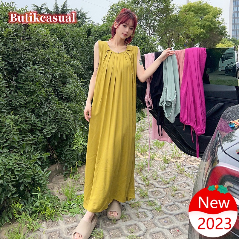 Đầm maxi Dáng Rộng Cổ Tròn Không Tay Màu Trơn Thời Trang Mùa Hè 2023