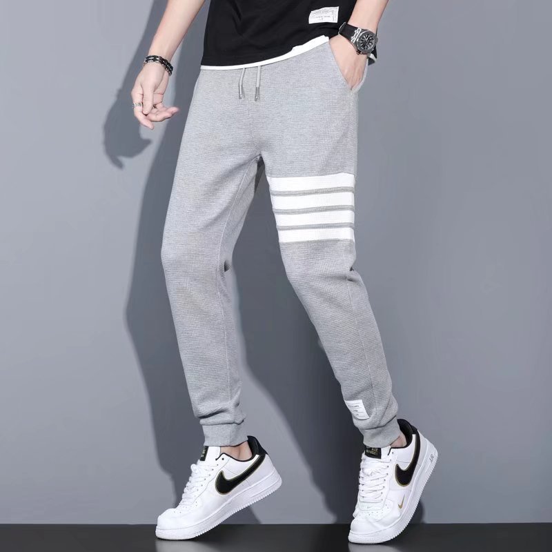 Quần jogger thể thao nam unisex chất xốp kẻ viền ngang bo gấu phong cách trẻ trung cá tính - Fashion Hand