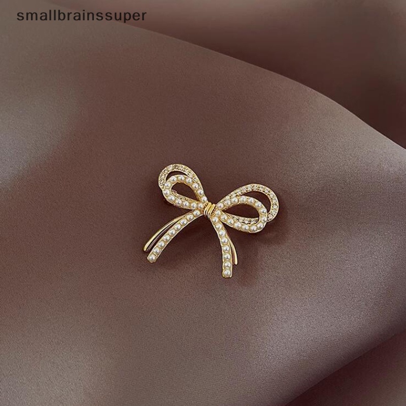 Ghim Cài Áo Hình Nơ Đính Ngọc Trai Chống Ánh Sáng Thời Trang Cao Cấp SBS