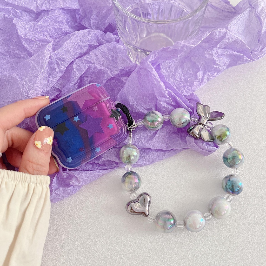 Vỏ Bảo Vệ Hộp Sạc Tai Nghe Bluetooth AirPods 1 2 gen3 pro2 2022 Bằng Silicon tpu Mềm Chống Trầy Hình Ngôi Sao Màu Tím Kèm Dây Đeo Chuỗi Ngọc Trai