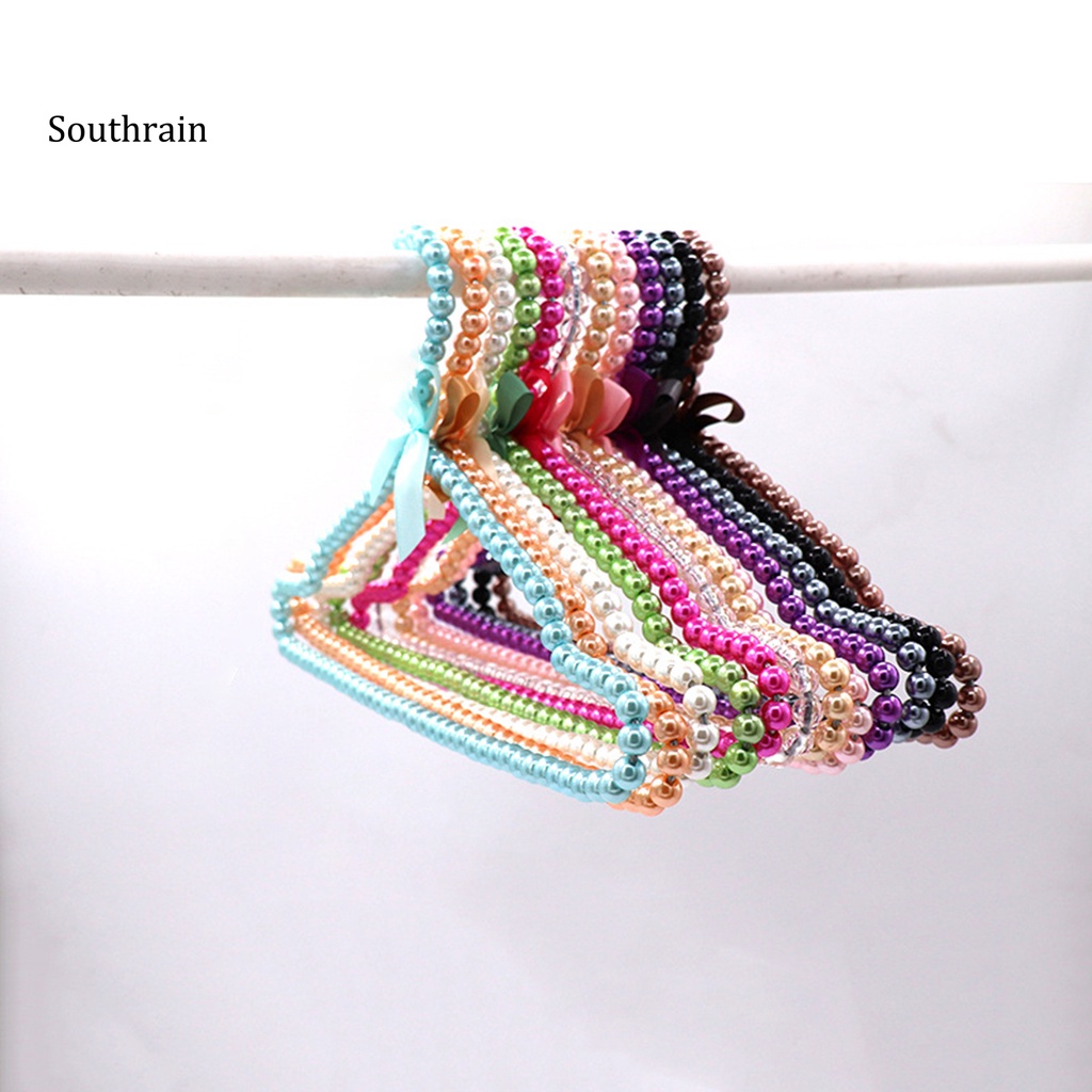 Set 2 Móc Treo Quần Áo Đính Nơ Và Ngọc Trai Nhân Tạo Bằng Nhựa Tiện Lợi