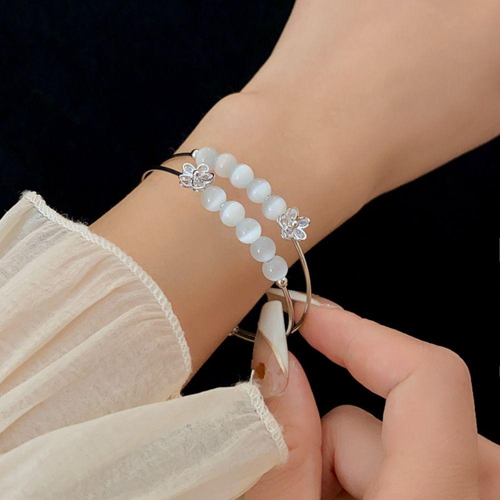 Vòng Đeo Tay Dạng Hở Màu Bạc Đính Hạt Mắt Mèo / Bướm Lấp Lánh Kiểu Hàn Quốc Sang Trọng Thời Trang