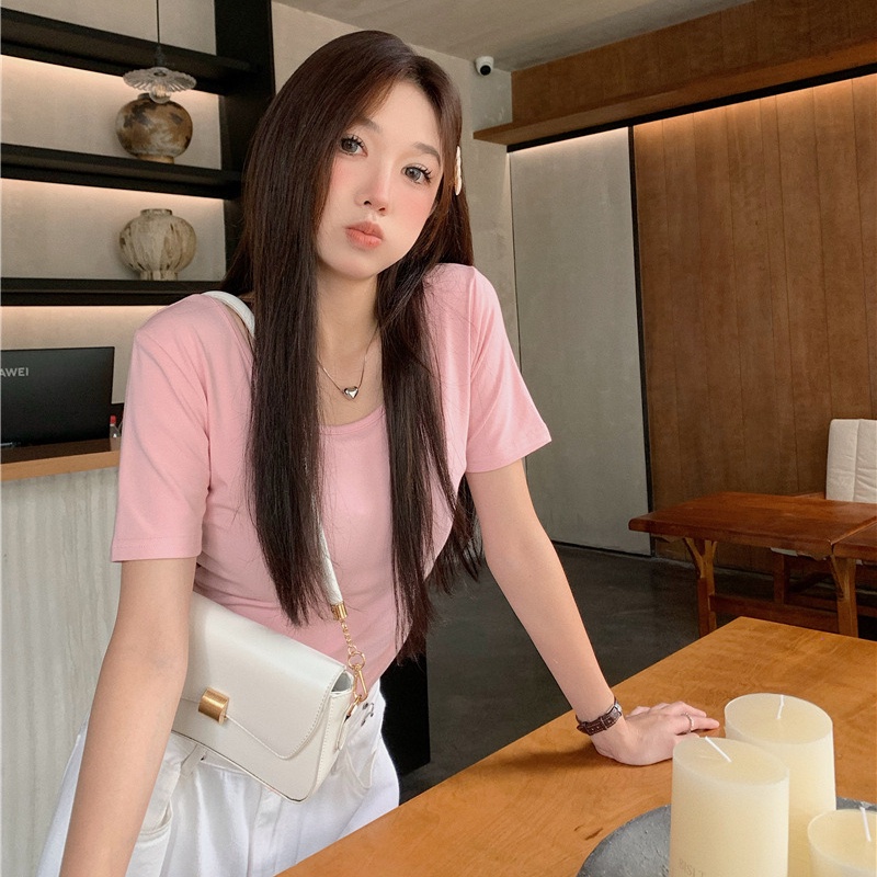 【WANG JIAO ZHAN】 Áo crop top nữ Phiên bản Hàn Quốc của áo phông ngắn tay ôm sát và áo ngắn hở lưng thon gọn【9979】