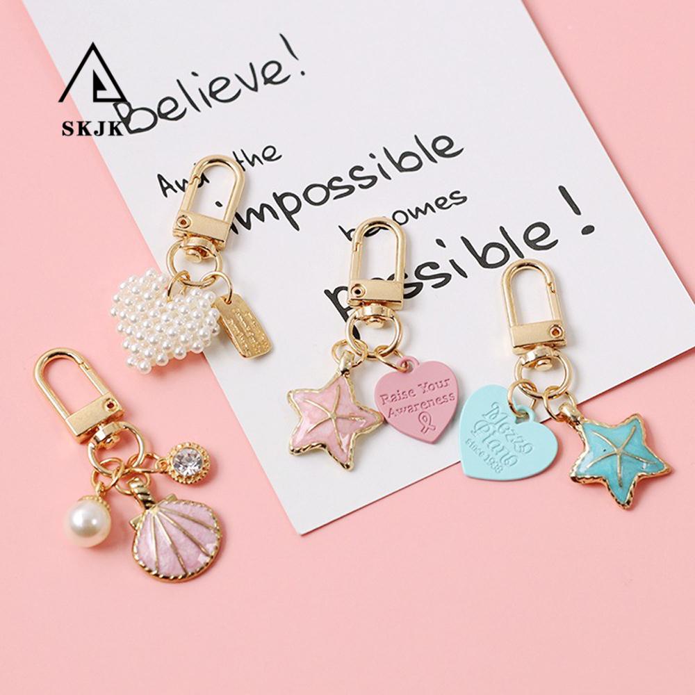 Móc Chìa Khóa Hình Trái Tim Và Ngôi Sao Màu Vàng Kim Dễ Thương Thời Trang Cho Nữ