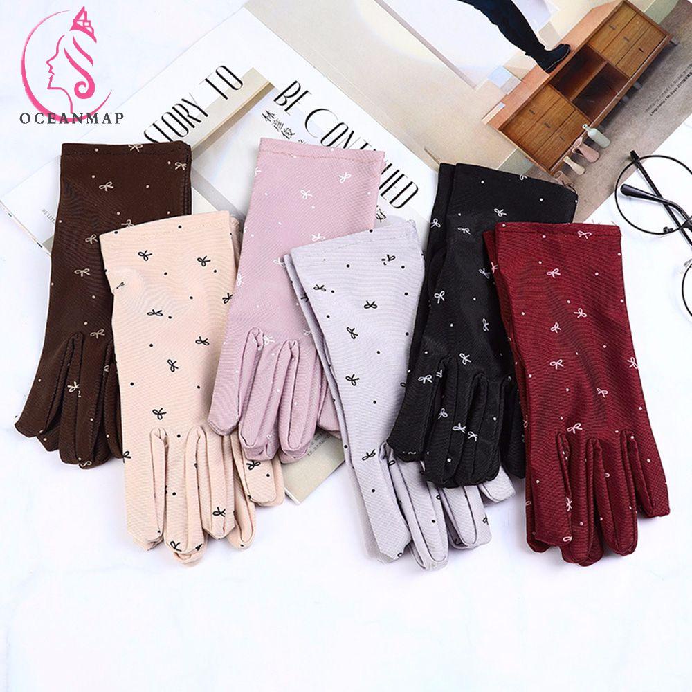 Găng Tay Chống Nắng Co Giãn Thoáng Khí Họa Tiết Nơ Nhiều Màu Sắc Cho Nam Nữ