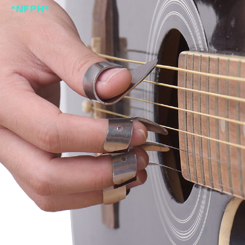 Bộ 4 Miếng Gảy Đàn Guitar Bằng Kim Loại Mới