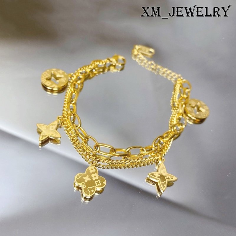 Vòng Tay Bằng Thép Titan Mạ Vàng 18K Mặt Hoa Nhỏ Thời Trang Cho Nữ