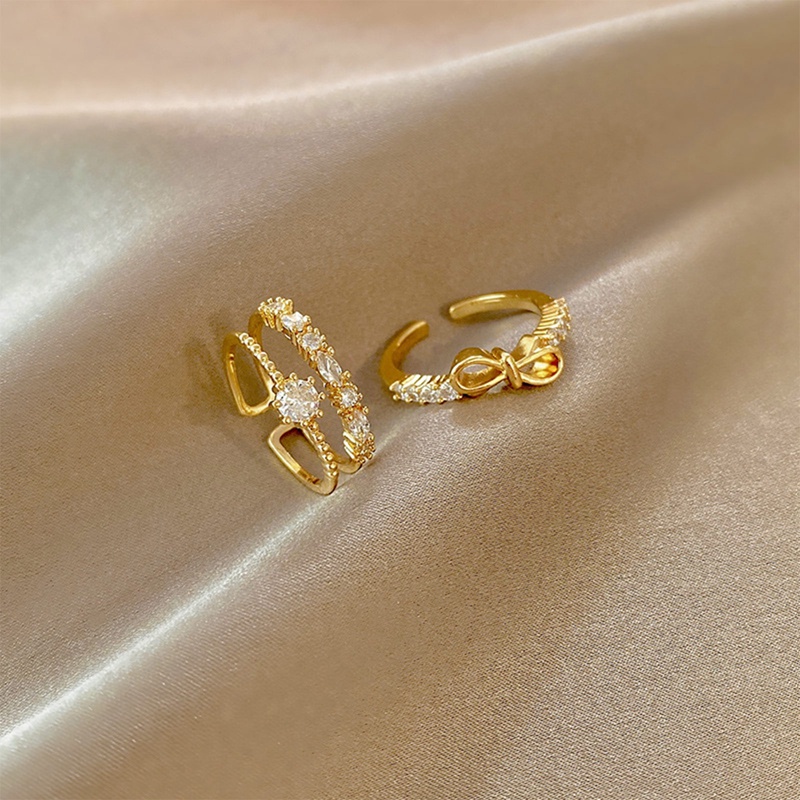 Ygt Bộ 2 Nhẫn Xếp Chồng Lên Nhau Đính Đá Zirconia Hình Nơ Đơn Giản Cá Tính Có Thể Điều Chỉnh Kích Thước Thời