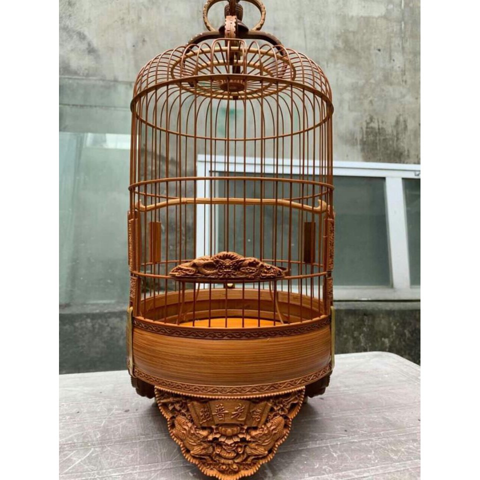 Lồng chim khuyên tre đục tinh xảo