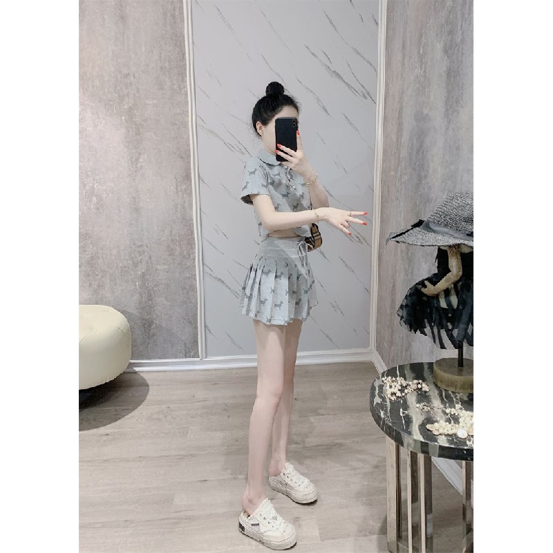 New Internet celebrity fashion folding collar polo shirt pleated skirt two-piece set small casual temperament short-sleeved T-shirt A- line skirt casual sports suit
