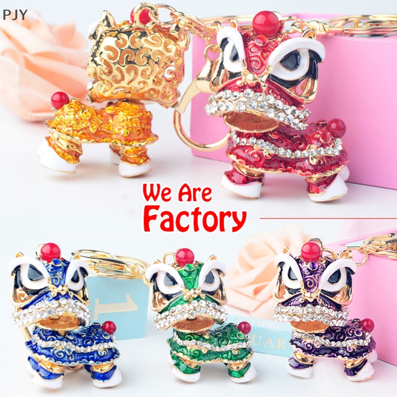 1 Móc Khóa Hình Sư Tử Đính Đá Pha Lê Xoay Được Dễ Thương