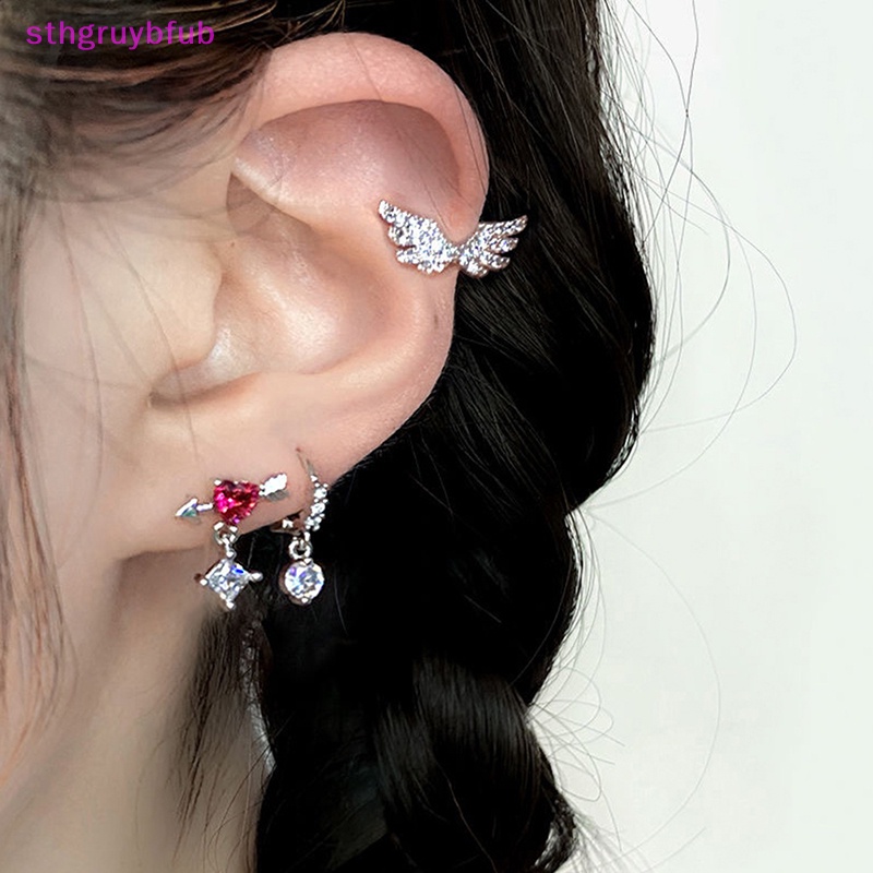 1 Khuyên Tai Hình Trái Tim Đôi Cánh Bằng Thép Không Gỉ Dễ Thương Cho Nữ