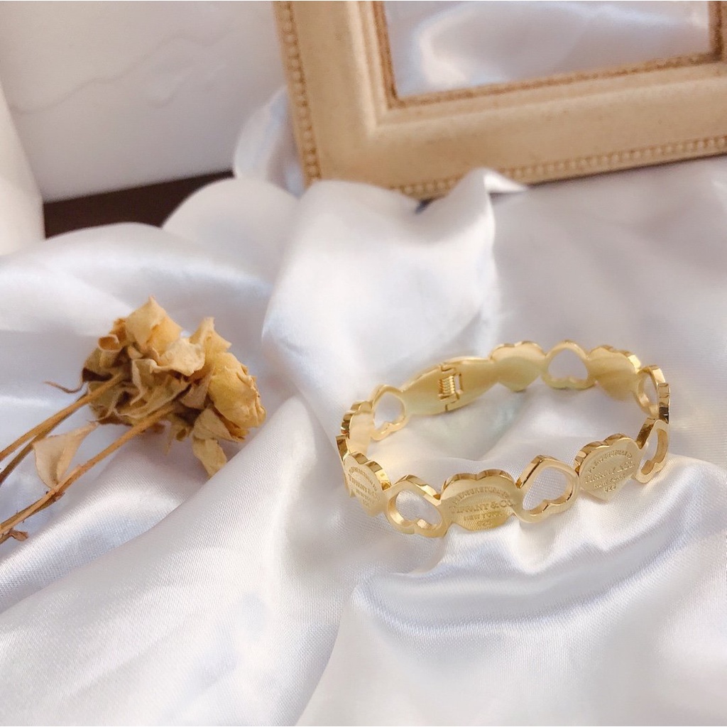 Vòng tay cartier thông thường vòng đeo tay tinh tế rỗng chữ t logo titan thép không thấm nước vòng tay chuỗi không gỉ