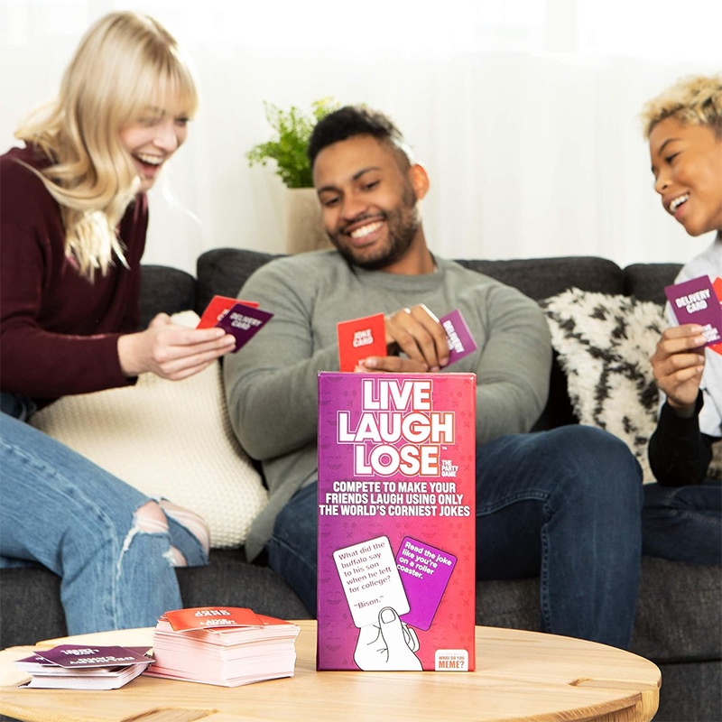 WHAT DO YOU MEME? Live Laugh Lose - The Party Game Where You Compete to Make Corny Jokes Funny