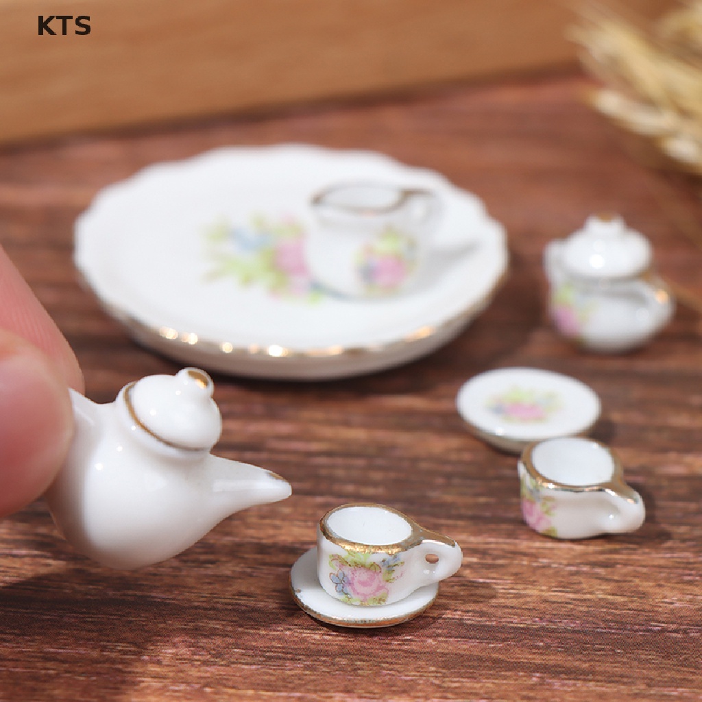 Bộ Ấm Trà Bằng Gốm Sứ 8 Chi Tiết Cỡ 1 / 12