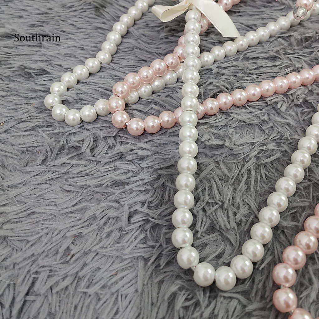 Set 2 Móc Treo Quần Áo Đính Nơ Và Ngọc Trai Nhân Tạo Bằng Nhựa Tiện Lợi