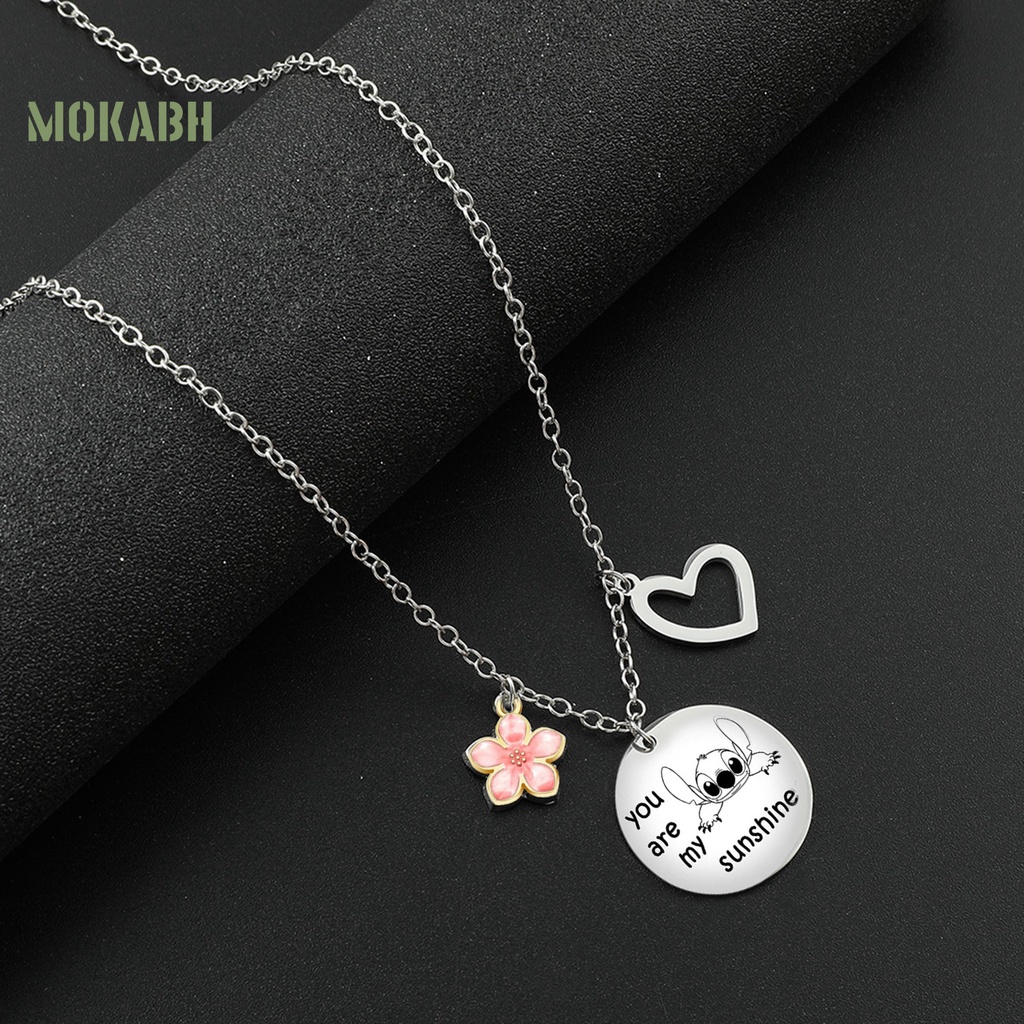 Vòng Cổ Bằng Thép Titan Mặt Hình Trái Tim Và Hoa Cá Tính