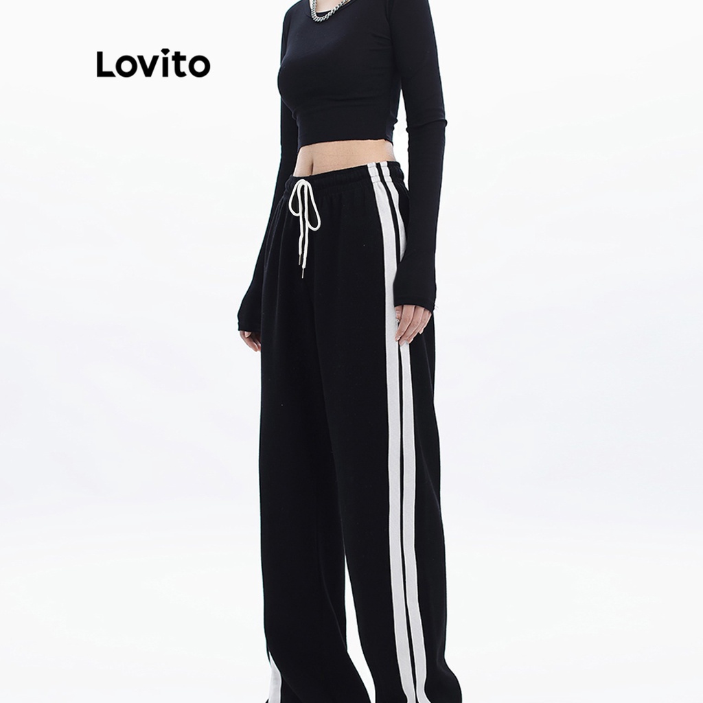 Quần Lovito màu trơn xẻ gấu phối viền tương phản phong cách thể thao L26AD073 (màu đen)