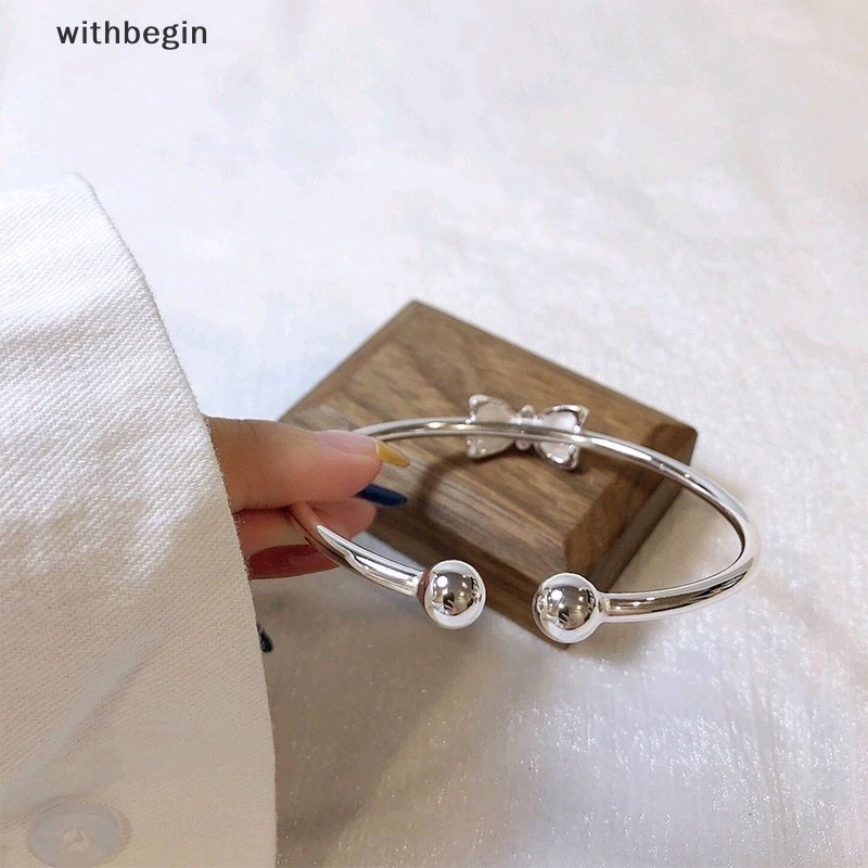 Vòng Đeo Tay Dạng Hở Màu Bạc Điều Chỉnh Được Phối Nơ Thời Trang Cho Nữ