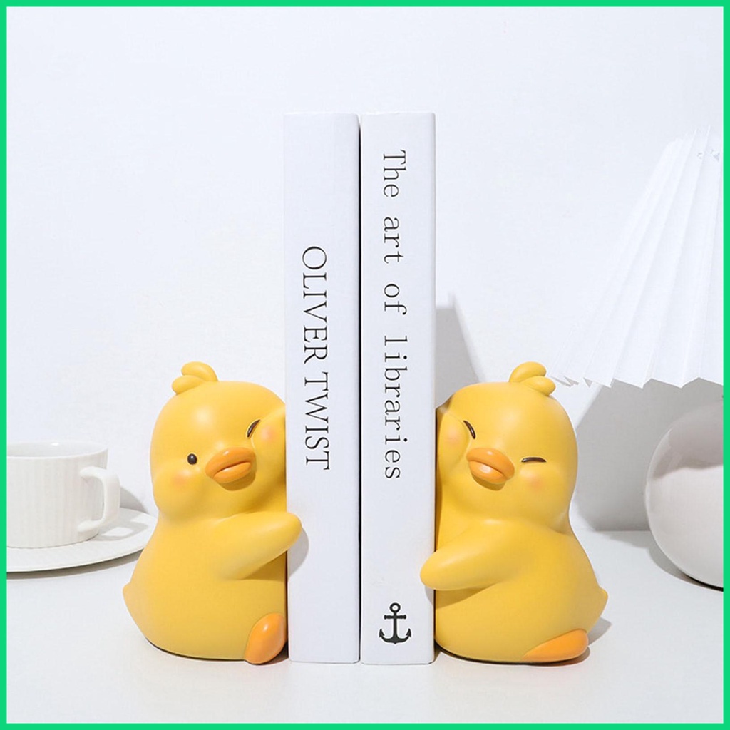 Phụ Kiện Chặn Sách Bằng Nhựa Resin Hình Chú Vịt Ôm Trái Tim Dễ Thương Dùng Trang Trí Bàn Ăn