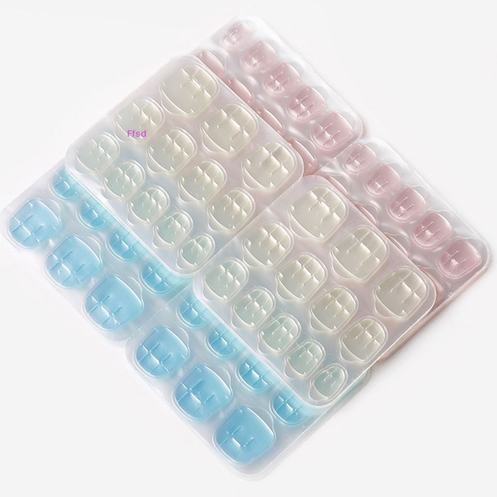 {Ffsd} Set 12 / 24 Dụng Cụ Kẹp Hai Mặt Trong Suốt Tự Dính Dạng Nhấn Cho Móng Tay Giả