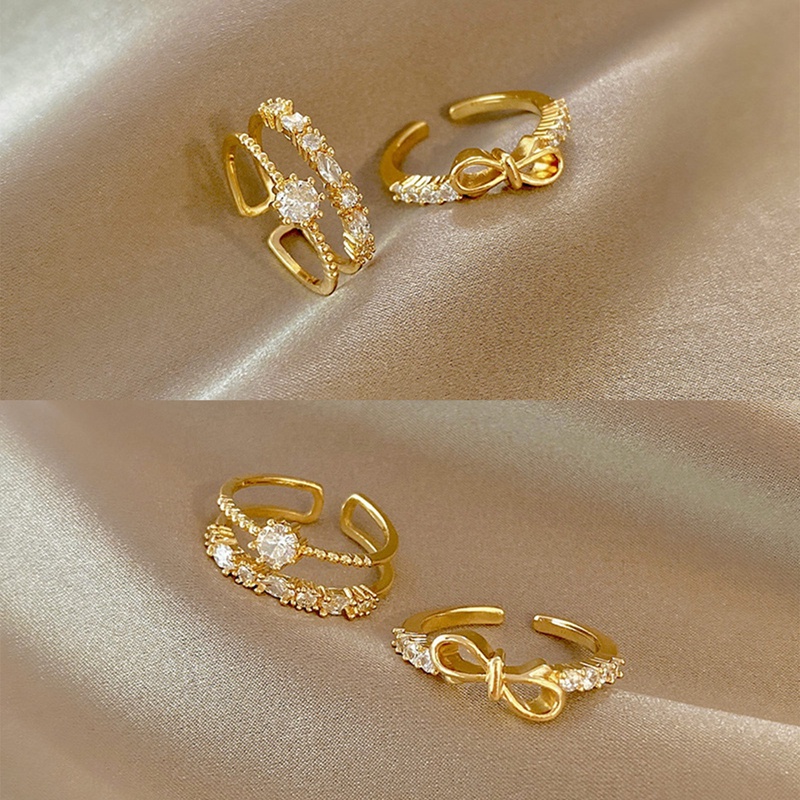 Ygt Bộ 2 Nhẫn Xếp Chồng Lên Nhau Đính Đá Zirconia Hình Nơ Đơn Giản Cá Tính Có Thể Điều Chỉnh Kích Thước Thời