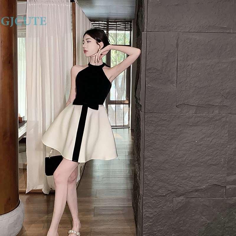 Đầm Dáng Chữ A Lưng Cao Màu Tương Phản Đính Nơ Xinh Xắn Cho Nữ