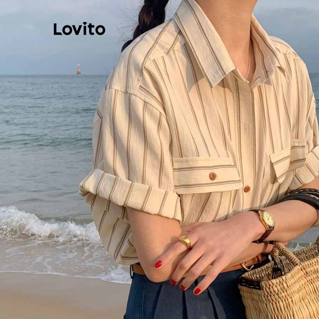 Áo kiểu Lovito cài nút phối túi kẻ sọc thanh lịch cho nữ LNE19095